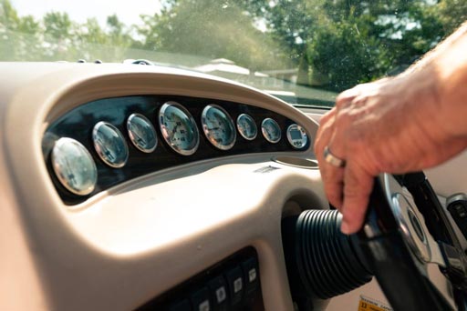 steering-wheel-and-dashboard-on-boat